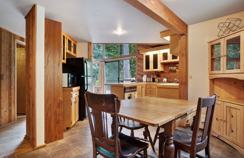 Baring Cabin | Riverfront cabin with soaring views of mountains & woodstove - dog-friendly