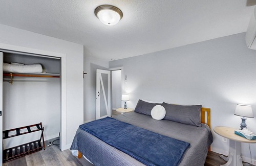 Post Falls House | Riverfront charmer with sunroom, gas grill, games, smart TVs, W/D, & partial AC