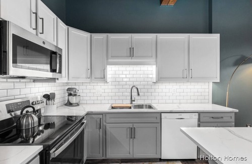 Grand Rapids Condo | Riverfront Condo for Professionals with Workspace & Prime Medical Mile Access.n