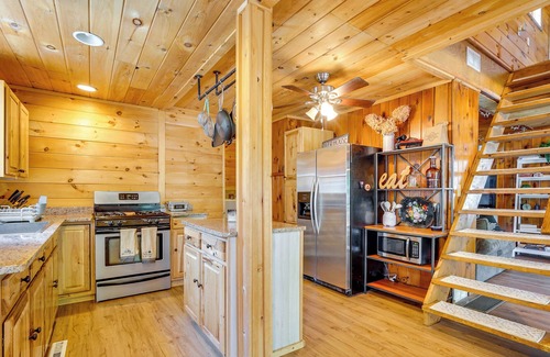 Lake Luzerne-Hadley Cabin | Riverfront Hadley Getaway w/ Fire Pit & Boat Dock!