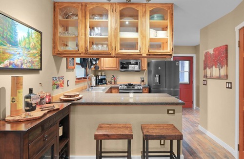 North Bend House | Riverfront Home in North Bend with Large Deck and Hot Tub. Pet-Friendly!
