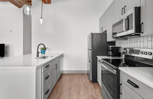 Downtown St. Louis Apartment | Riverfront Loft - Steps from Arch & Convention Center - Walk to Stadiums