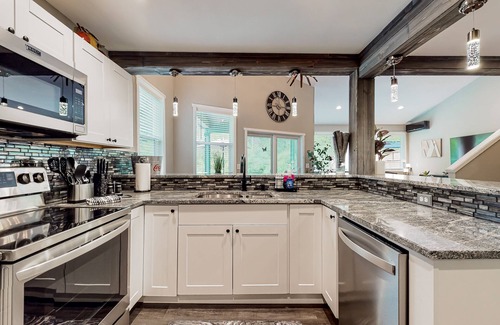 Mason County House | Riverfront property with three cabins, hot tubs, firepits, kayaks - beach access