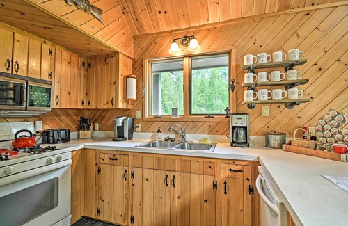 Mayfield Cabin | Riverfront Traverse City Cabin Near Snowmobiling!