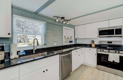 Braden River House | Riverside Oasis! Home w/Tiki Hut & Firepit
