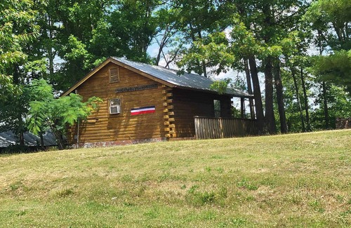 Mammoth Spring Cabin | Riverview Cabins viewing Mammoth Spring State Park and Hatchery