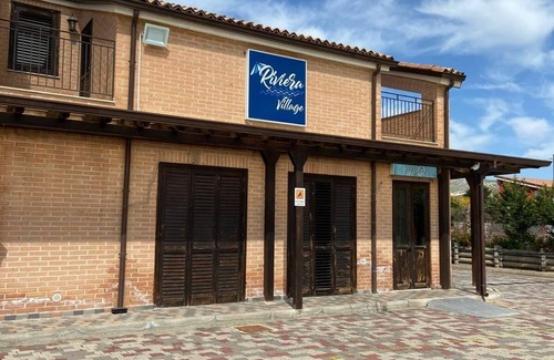 Butera Hotel | Riviera Village