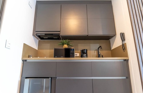 Cali Apartment | RM 1005 | High-Rise Studio | Balcony | Pool | Gym