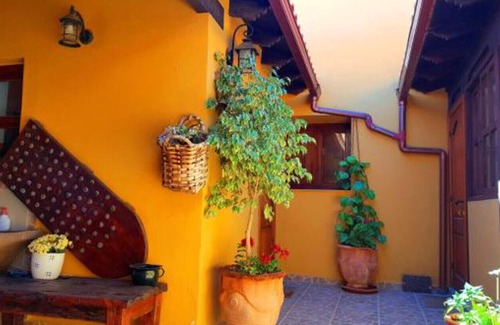 Arico Cottage | Romantic, historic country house with tropical garden