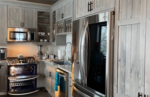 Anaconda Cottage | Romantic River Front Cottage at Old Works Golf Course! Hot Tub and Sauna!