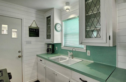 Old Town House | Romantic storybook cottage nestled in the bougainvillea of old town Port A!