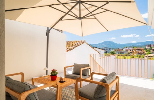 Lotzorai Apartment | Room 'Longevity' with Private Terrace, Wi-Fi and Air Conditioning