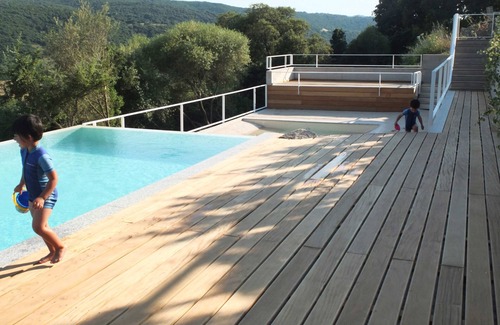 Aglientu Apartment | Room 'Tarzan Jane' with Shared Pool, Private Terrace and Air Conditioning