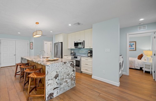 Kings Lake House | Rovigo Vacation Rental: Spacious Retreat with Panoramic Lake Views in Kings Lake. 4-BR, 4-Bathroom Home with Private Pool, just 3.4 Miles from the Vibrant Fifth Avenue South and Naples Attractions