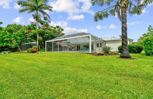 Kings Lake House | Rovigo Vacation Rental: Spacious Retreat with Panoramic Lake Views in Kings Lake. 4-BR, 4-Bathroom Home with Private Pool, just 3.4 Miles from the Vibrant Fifth Avenue South and Naples Attractions