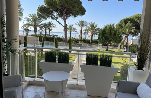 La Bocca Apartment | Royal palm with swimming pools: Apartment with terrace, sea and garden view