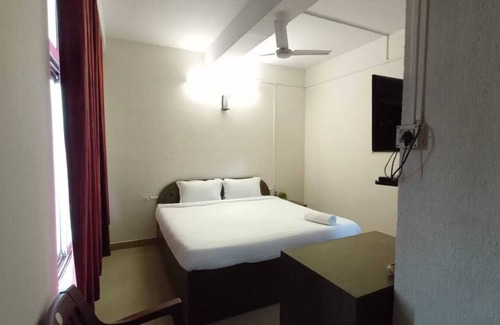 Beltola Hotel | Rudraksh Inn