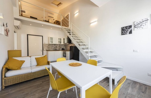San Lorenzo Apartment | Ruote Stylish Loft in Florence by Mmega