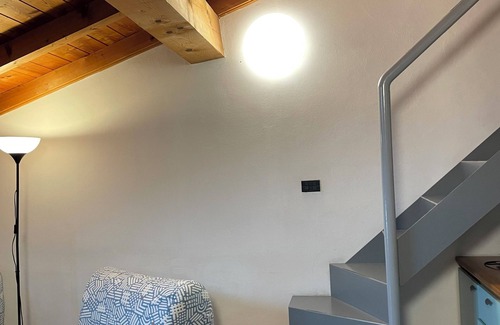 Citta Bassa House | rustic apartment with fireplace