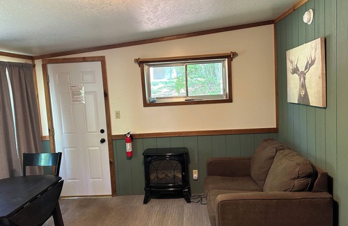 Palmyra Cabin | Rustic cabins in secluded campground with lake access and woods to wander in.
