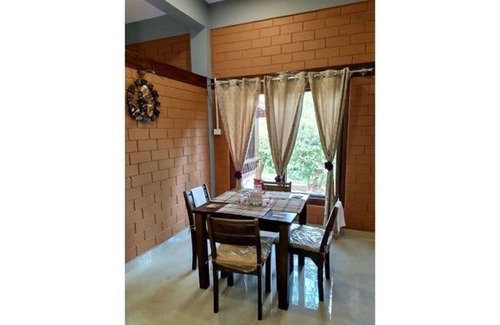 Kaimane House | Rustic Charm Wayanad - Interlocked (Entire studio)