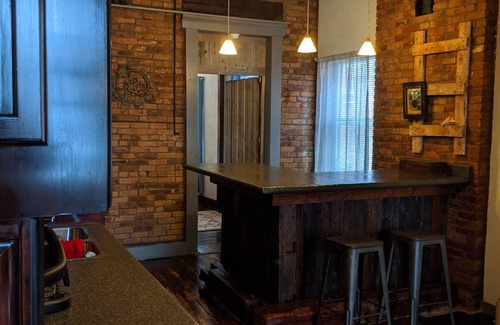 Utica Apartment | Rustic Downtown Utica Apartment