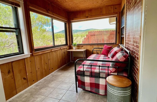 San Lorenzo Cabin | Rustic modern cabin on a cliff face with amazing views.