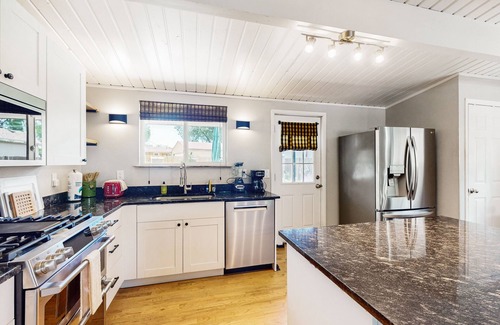 Central Colorado Springs House | Rustic mountain view home w/large yard, pond, & updated kitchen - dog-friendly