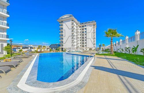 Payallar Apartment | Sıfır Muhteşem Havuzlu Aileye Özel 1e1 Rezidans
