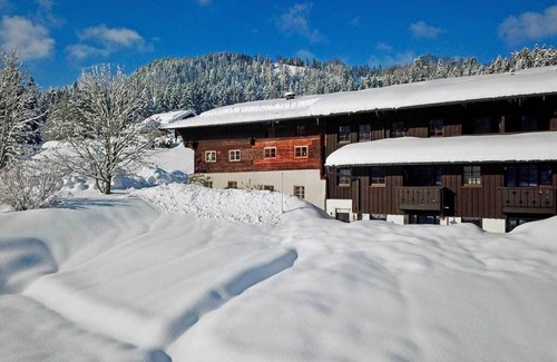 Maxlrain Apartment | Sachrang: Ferien-wohnung am See mit Bergblick