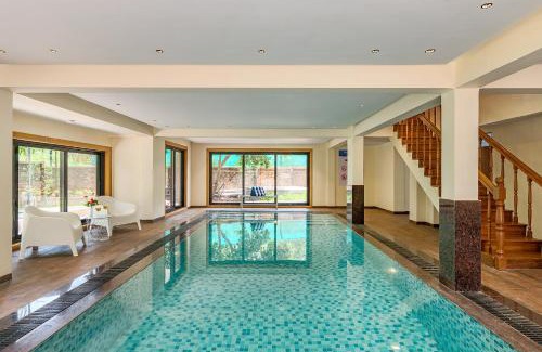 St.Stanislaus Villa Villa | SaffronStays Windermere, Lonavala - luxury villa with heated pool, projector room and indoor games