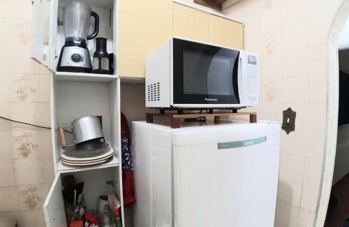 Aparecida Apartment | Sala-living/1 quadra da praia