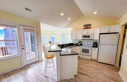 Village of Stump Sound House | Sand Dancer – Sun, Surf & Poolside Relaxation