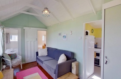 Hayle Ski Chalet | Sandford is a charming, traditional beach chalet, with great sea views.