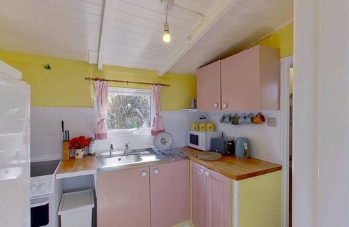 Hayle Ski Chalet | Sandford is a charming, traditional beach chalet, with great sea views.