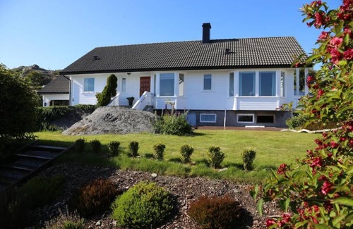 Sandve Apartment | Sandve, spacious apartment, in quiet neighborhood. Sea view.
