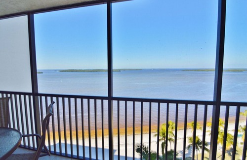 Punta Rassa Condo | Sanibel Harbour Resort Bay View Tower 837: Unwind & recharge in the wrap-around lanai.