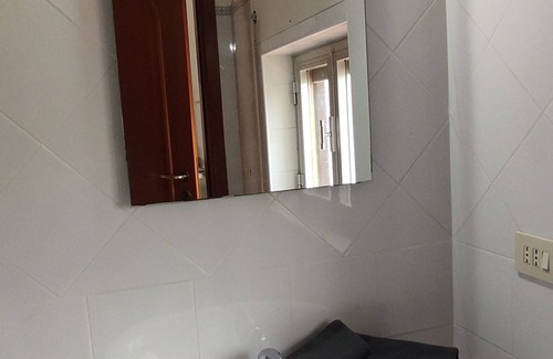 Quartiere XXXIV Lido di Ostia Levante Apartment | Sea view terrace 300 meters from the beach. and for the winter the fireplace.