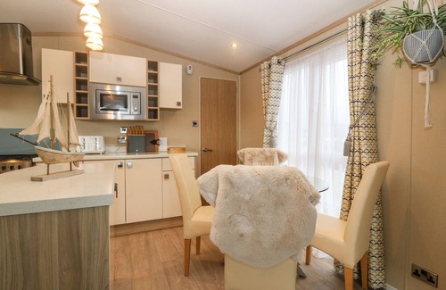 Rhyd-y-clafdy Cottage | SEAFRONT HOLIDAY HOME 2, pet friendly, with pool in Pwllheli