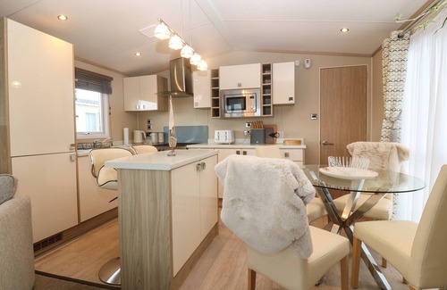 Rhyd-y-clafdy Cottage | SEAFRONT HOLIDAY HOME 2, pet friendly, with pool in Pwllheli