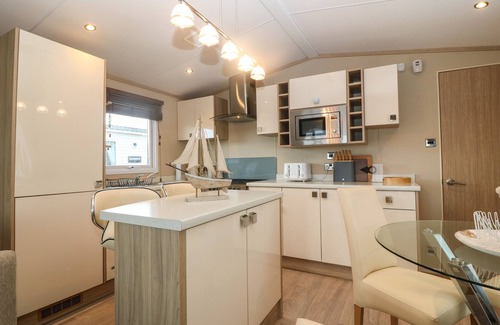 Rhyd-y-clafdy Cottage | SEAFRONT HOLIDAY HOME 2, pet friendly, with pool in Pwllheli