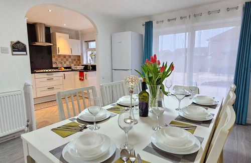 Port Talbot House | Seaside holiday home with large garden & short walk to beach