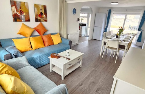 Port Talbot House | Seaside holiday home with large garden & short walk to beach