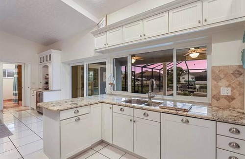 Apollo Beach House | Seaside Oasis! Dog-Friendly, Waterfront, Private Dock, Saltwater Pool & Spa,