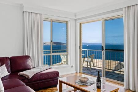 Sandy Bay House | Seaside Serenity: Panoramic Waterfront Retreat