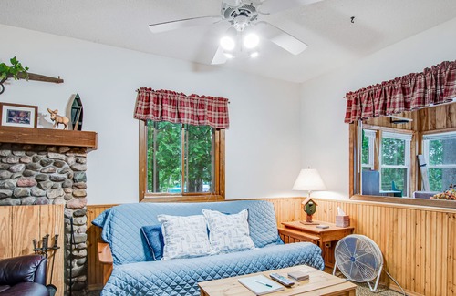 Tomahawk Cabin | Secluded lakefront cabin with private beach, deck, views & firepit- dog-friendly