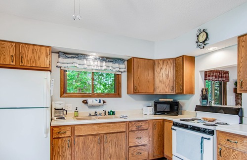 Tomahawk Cabin | Secluded lakefront cabin with private beach, deck, views & firepit- dog-friendly
