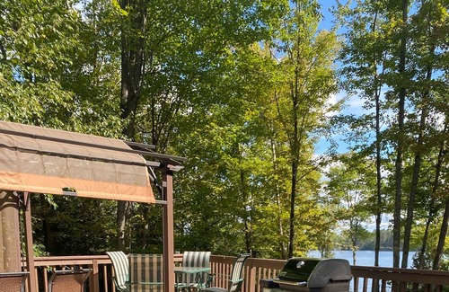 Florence House | Secluded lakefront property, sand beach, water slide, kayaks, and paddleboards!