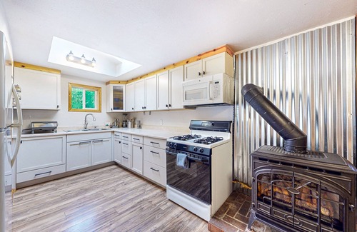 Bellingham House | Secluded, single-level getaway with a large yard, gas fireplace, & dog friendly