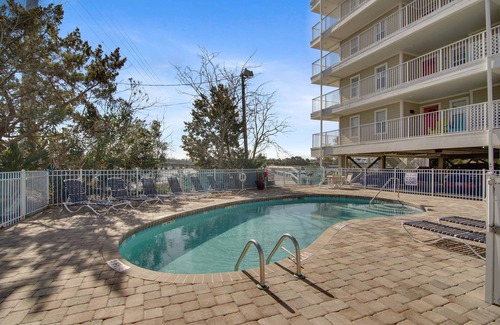 Folly Beach Villa | Second-floor condo with river views and access to a community pool